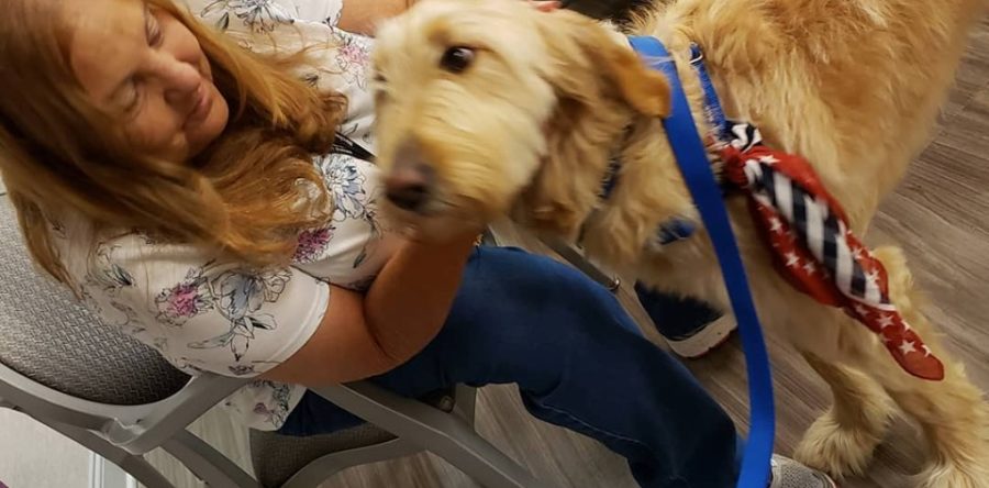 Kheiron bringing some joy to the residents at Birchwood Assisted Living